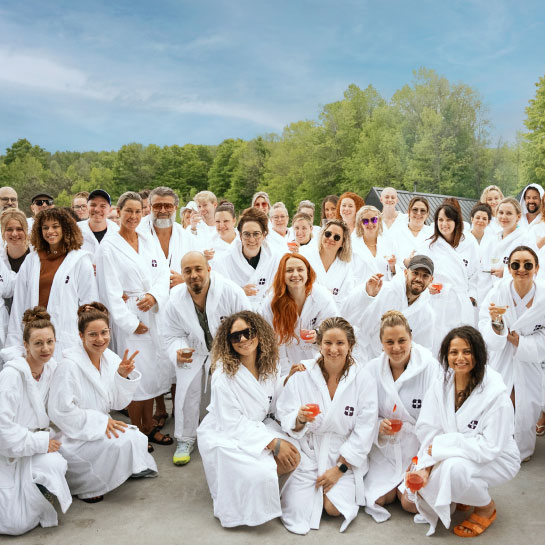 A group posing for a picture at Vetta Nordic Spa